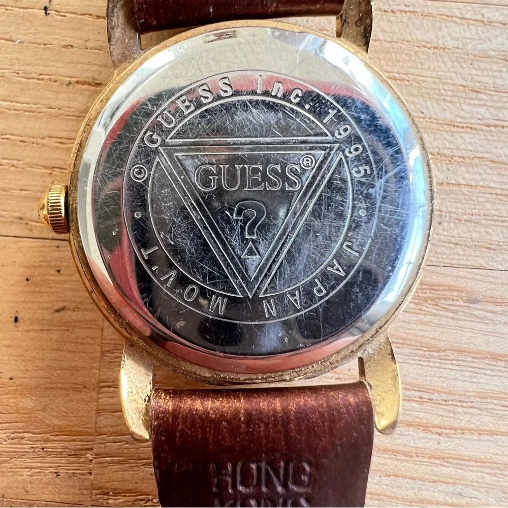 Vintage Guess ladies gold tone logo leather dress Watch NEW BATTERY